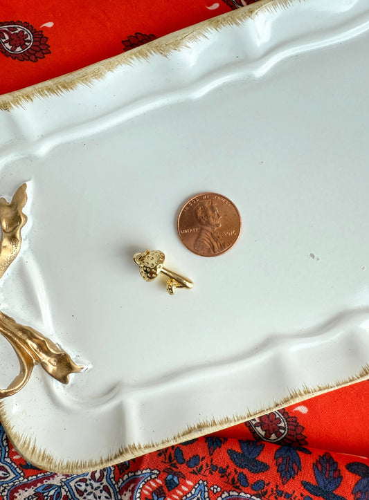 Gold mushroom charm